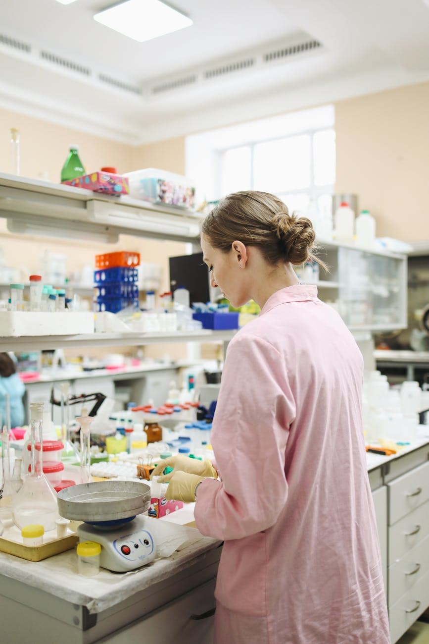 A female scientist conducting research in a well-equipped laboratory.